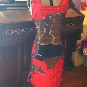 Looking Good sleeveless shift dress with self fabric tie .